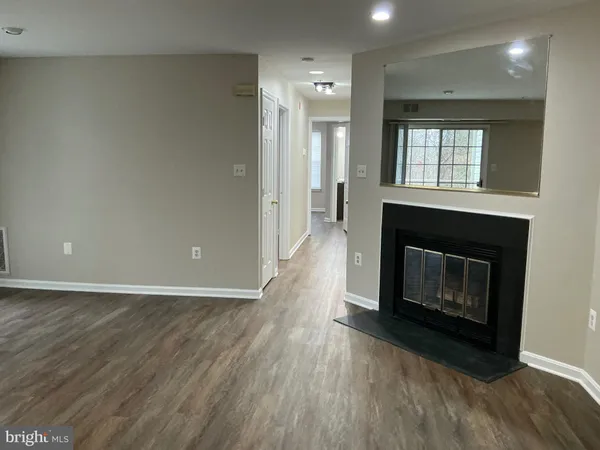 an empty room with sliding door