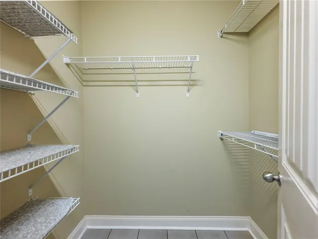 a view of a livingroom with a flat screen tv and outdoor space