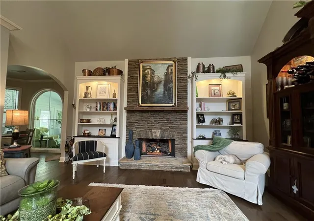 a view of a street with large trees