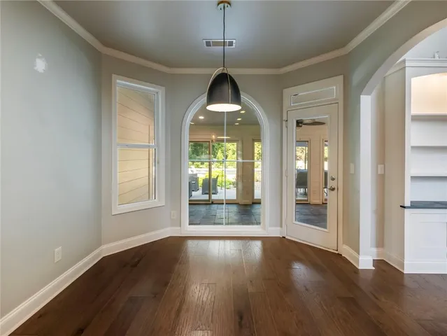 an aerial view of a house with a garden