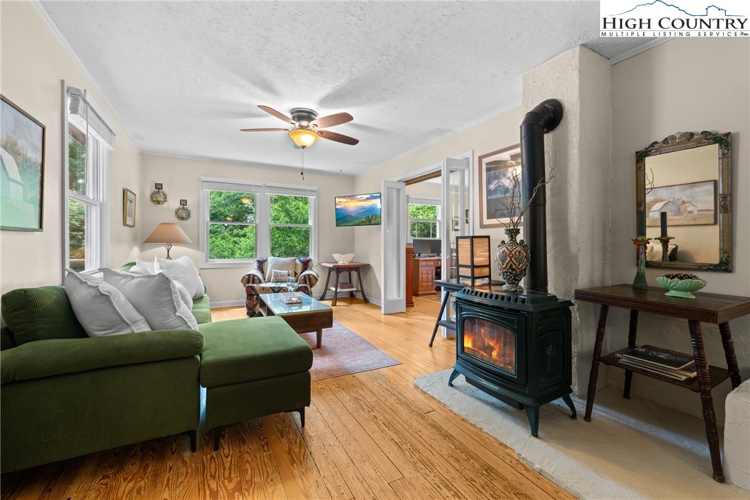 260 Sunny Acres Overlook, Unit OVERLOOK Boone, NC 28607 - Photo 8 of 28 a living room with furniture and a fireplace