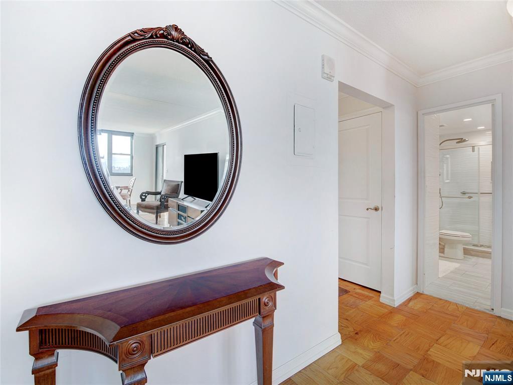 250 Gorge Road, Unit 17L Cliffside Park, NJ 07010 - Photo 11 of 30 a view of a livingroom with furniture and mirror