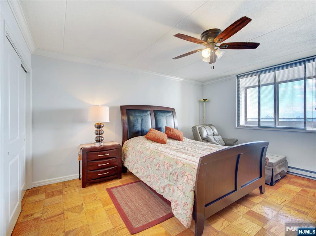 250 Gorge Road, Unit 17L Cliffside Park, NJ 07010 - Photo 12 of 30 a bedroom with a bed and window