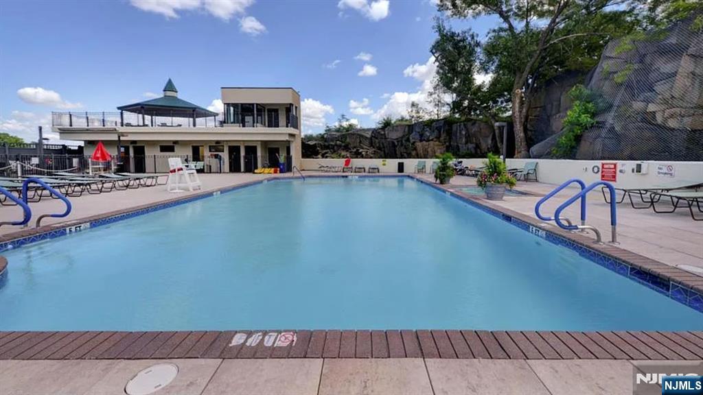 250 Gorge Road, Unit 17L Cliffside Park, NJ 07010 - Photo 19 of 30 a view of a swimming pool with a patio