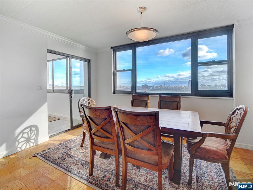250 Gorge Road, Unit 17L Cliffside Park, NJ 07010 - Photo 3 of 30 a view of a dining room with furniture and window