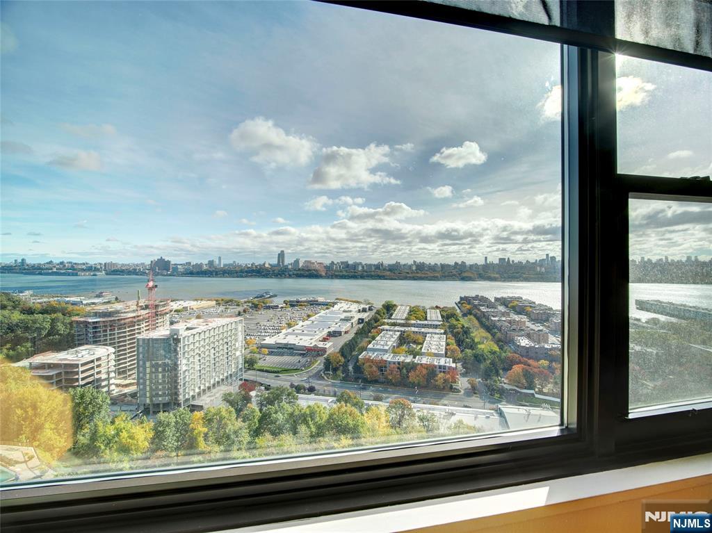 250 Gorge Road, Unit 17L Cliffside Park, NJ 07010 - Photo 7 of 30 a view of a lake from a window