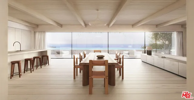 an outdoor space with lots of tables and chairs