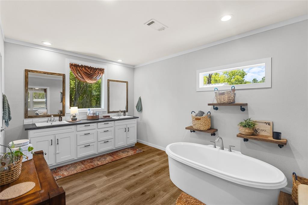645 VZ County Road Ben Wheeler, TX 75754 - Photo 12 of 38 a bathroom with a granite countertop sink mirror and toilet