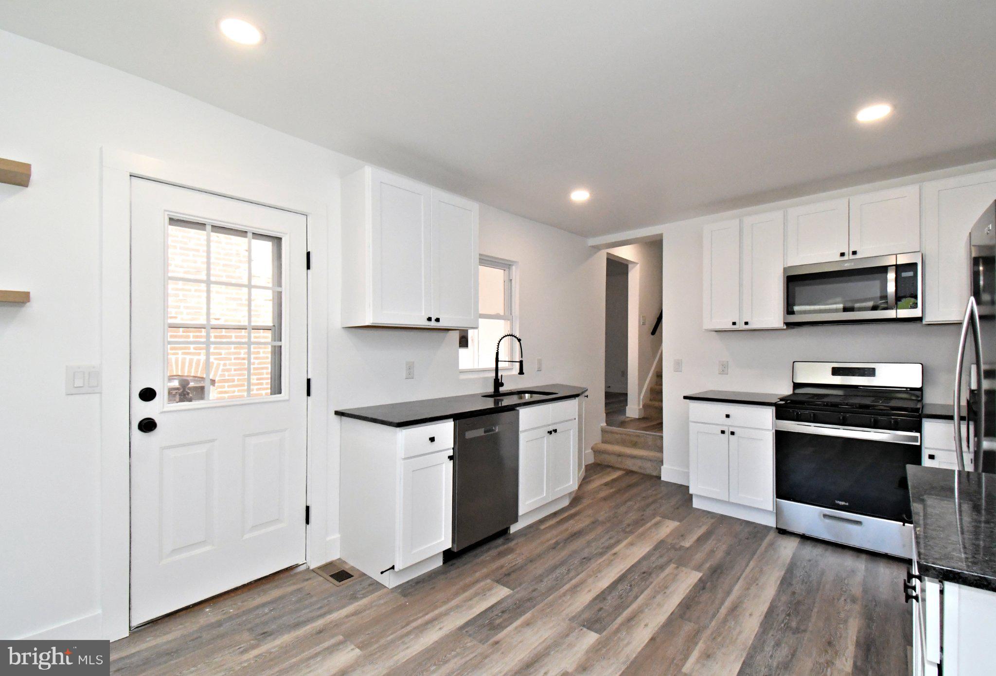 64 North Main Street Spring City, PA 19475 - Photo 9 of 26 Modern kitchen with sleek finishes.
