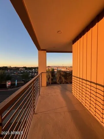 a view of balcony with furniture