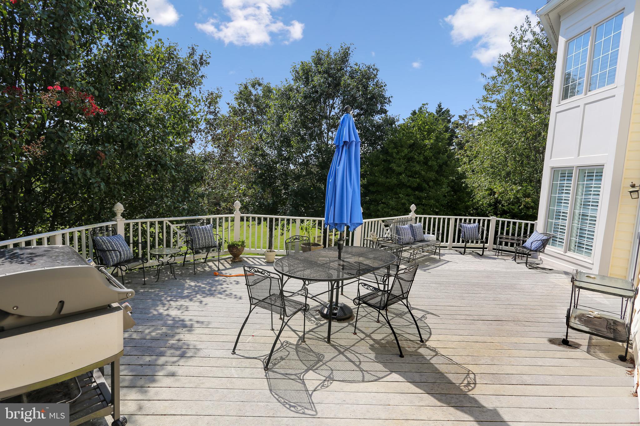 2113 Link Road Silver Spring, MD 20905 - Photo 63 of 78 a view of a chairs and table on the deck