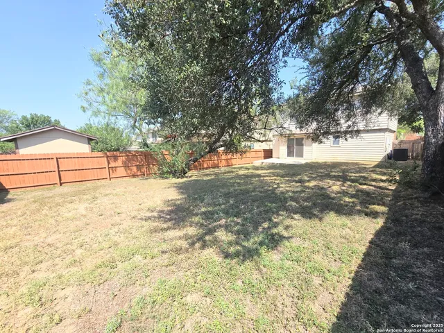 a view of empty space and yard