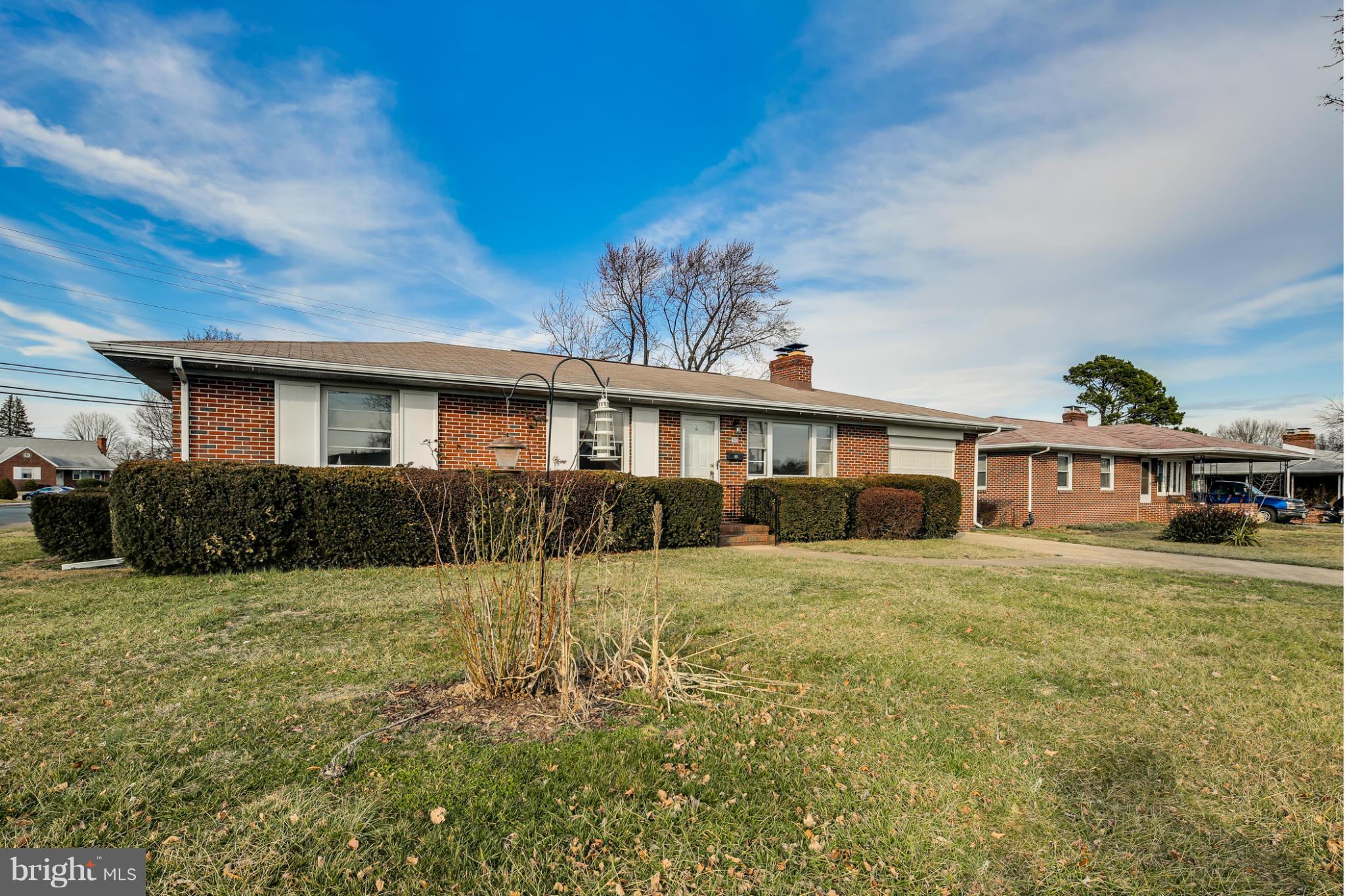 700 East Maple Road Linthicum, MD 21090 - Photo 28 of 29 a front view of a house with a garden