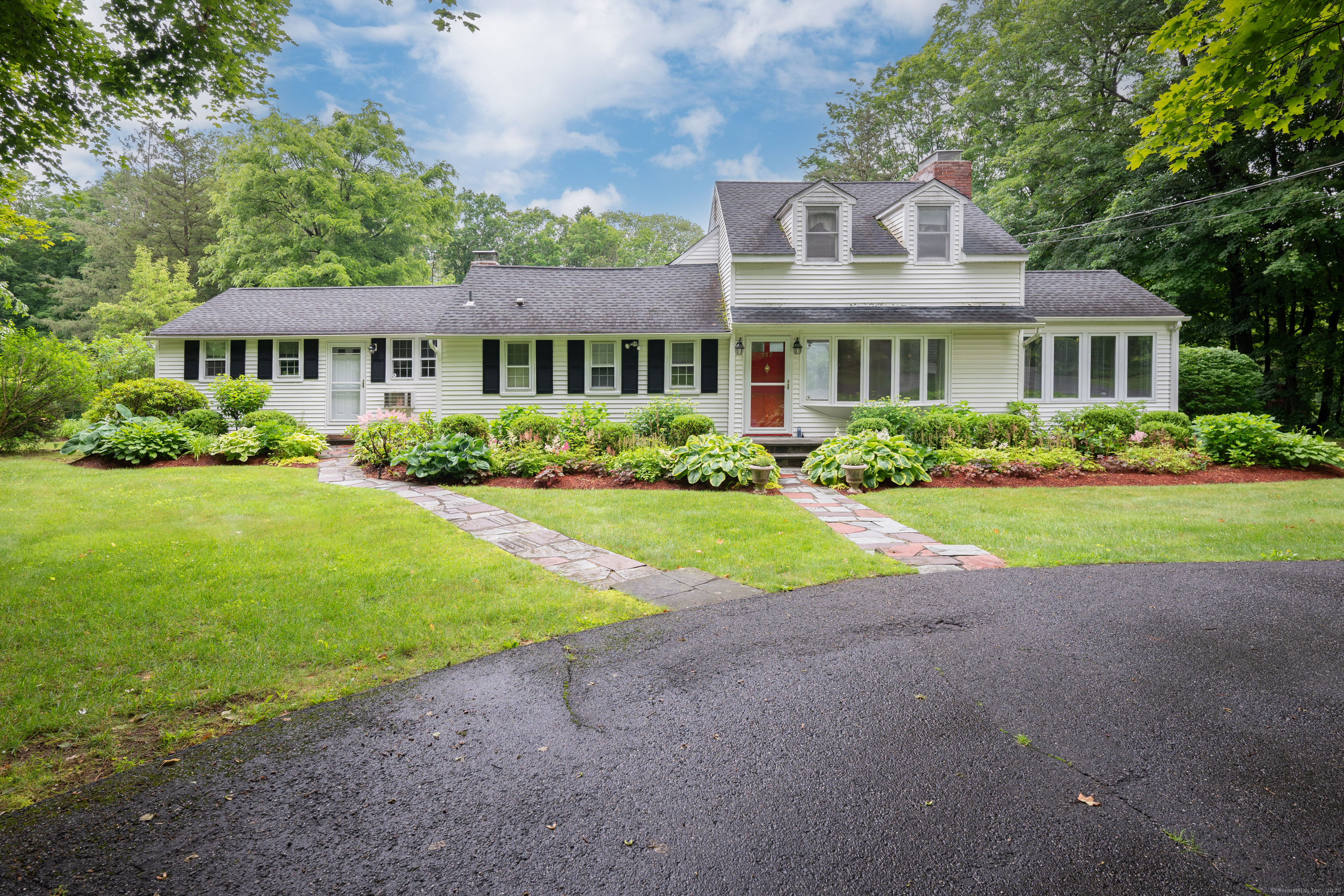 117 Long Meadow Hill Road Brookfield, CT 06804 - Photo 1 of 1 a front view of a house with a yard