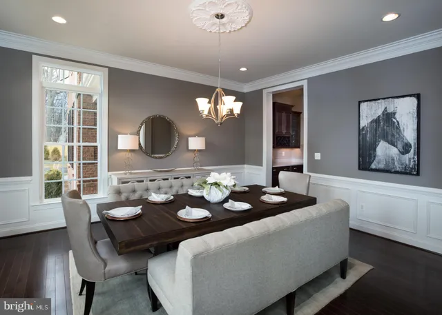 a large spacious bathroom with a large tub and sink