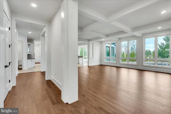 a view of kitchen with furniture and wooden floor