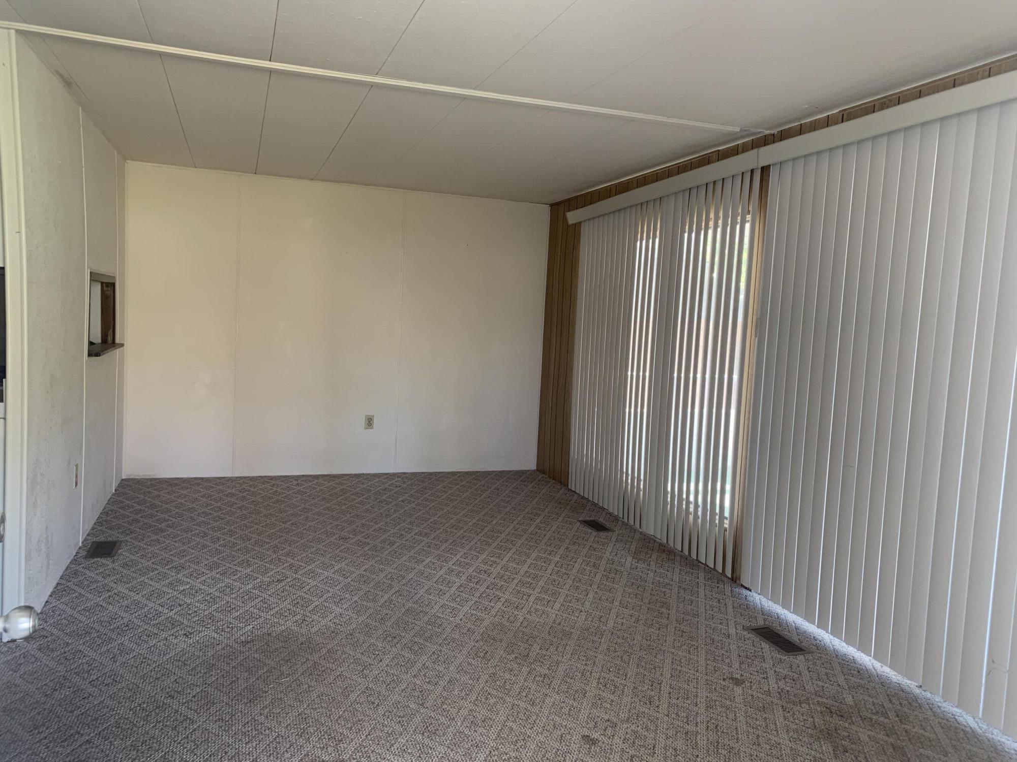 69430 Fairway Road Desert Hot Springs, CA 92241 - Photo 11 of 21 a view of an empty room with a window