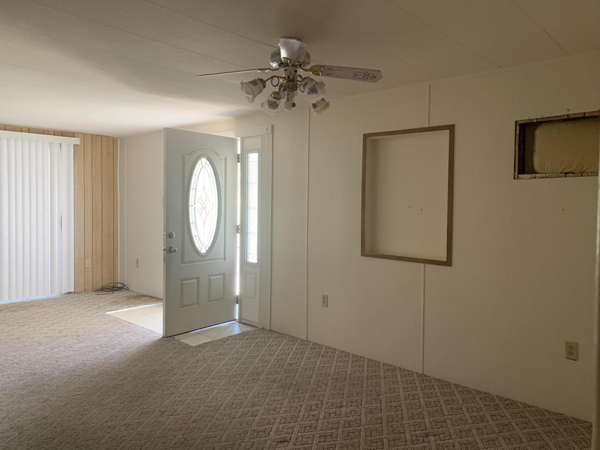 69430 Fairway Road Desert Hot Springs, CA 92241 - Photo 13 of 21 a view of a hallway with a mirror