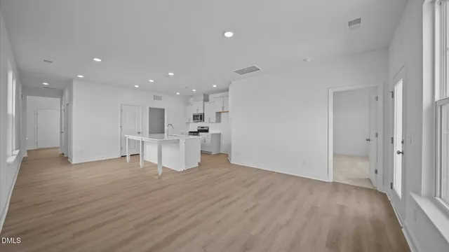 an empty room with windows