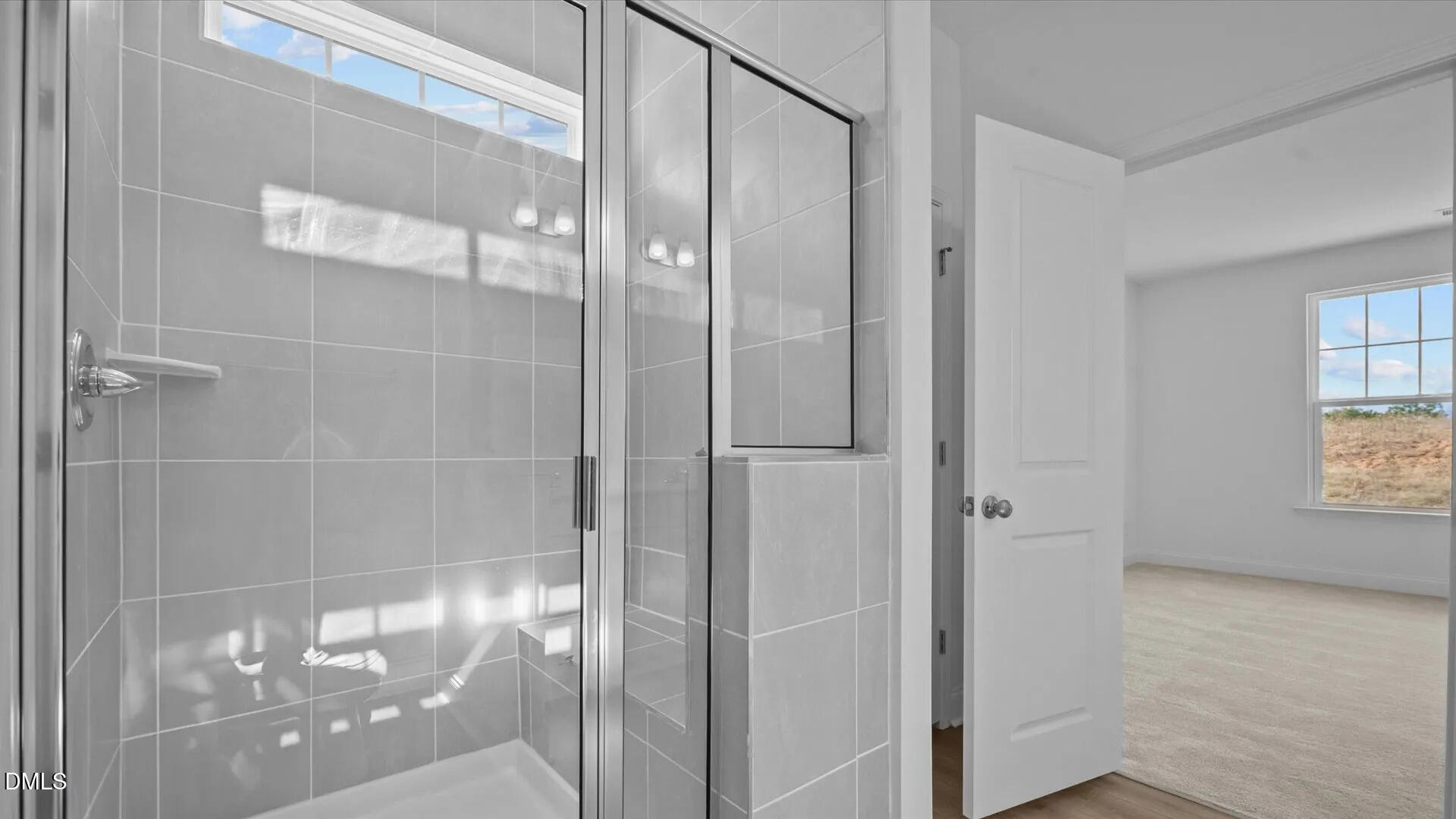 23 Gerrad Street, Unit 68 Franklinton, NC 27525 - Photo 17 of 23 a bathroom with a glass shower door