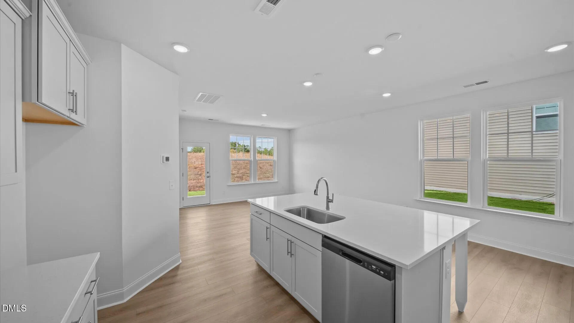 23 Gerrad Street, Unit 68 Franklinton, NC 27525 - Photo 7 of 23 a view of a kitchen area with furniture and window