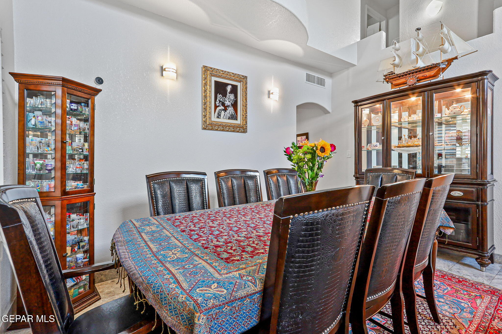 6544 Royal Ridge Drive El Paso, TX 79912 - Photo 14 of 58 a view of a dining room with furniture a livingroom and wooden floor