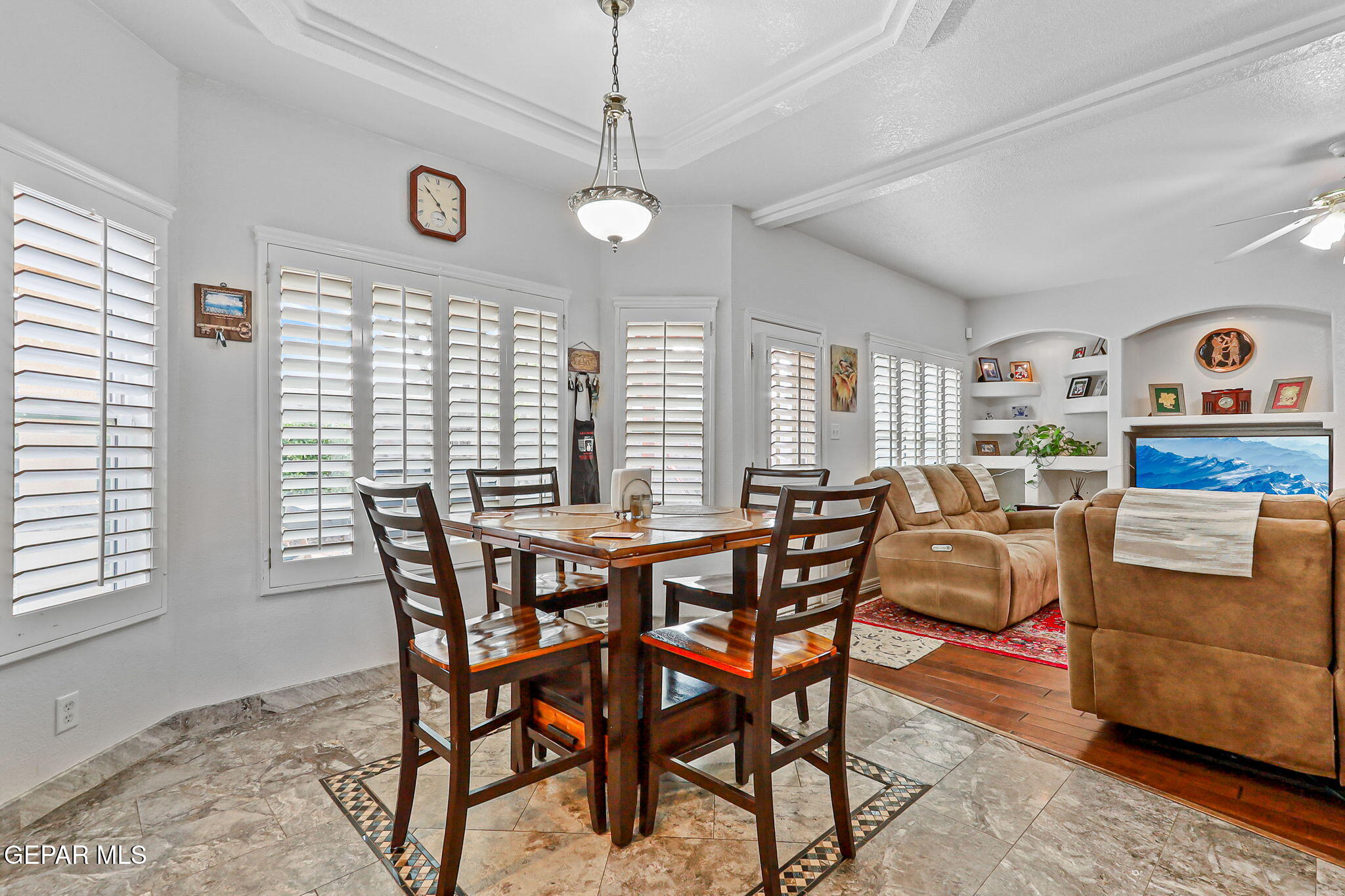 6544 Royal Ridge Drive El Paso, TX 79912 - Photo 16 of 58 a view of a dining room with furniture and a large window