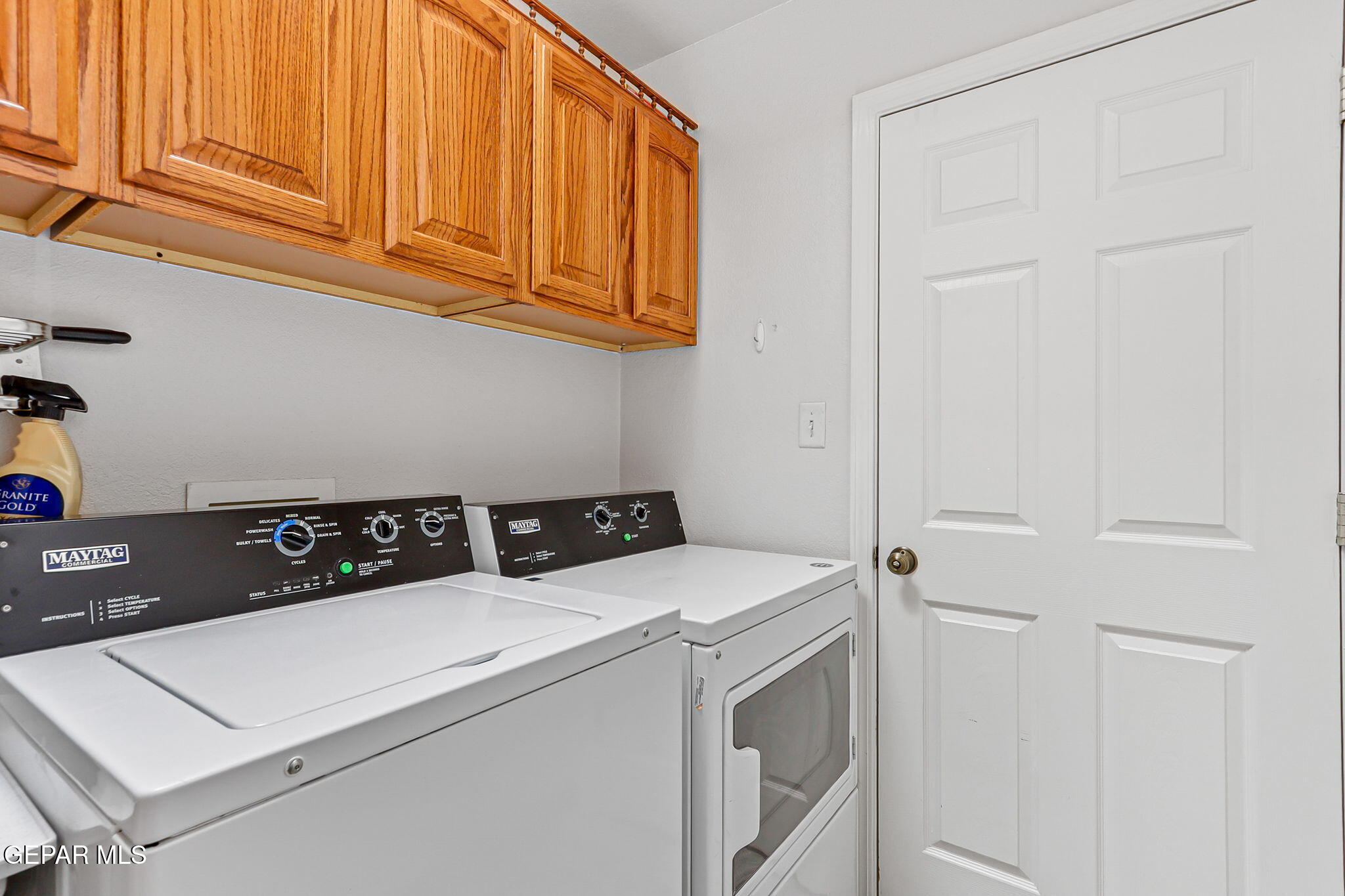6544 Royal Ridge Drive El Paso, TX 79912 - Photo 23 of 58 a utility room with dryer and washer