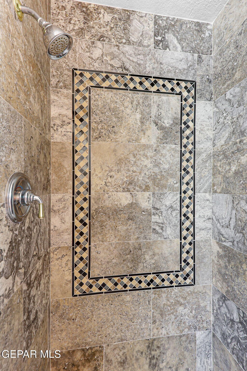 6544 Royal Ridge Drive El Paso, TX 79912 - Photo 27 of 58 a bathroom with a shower