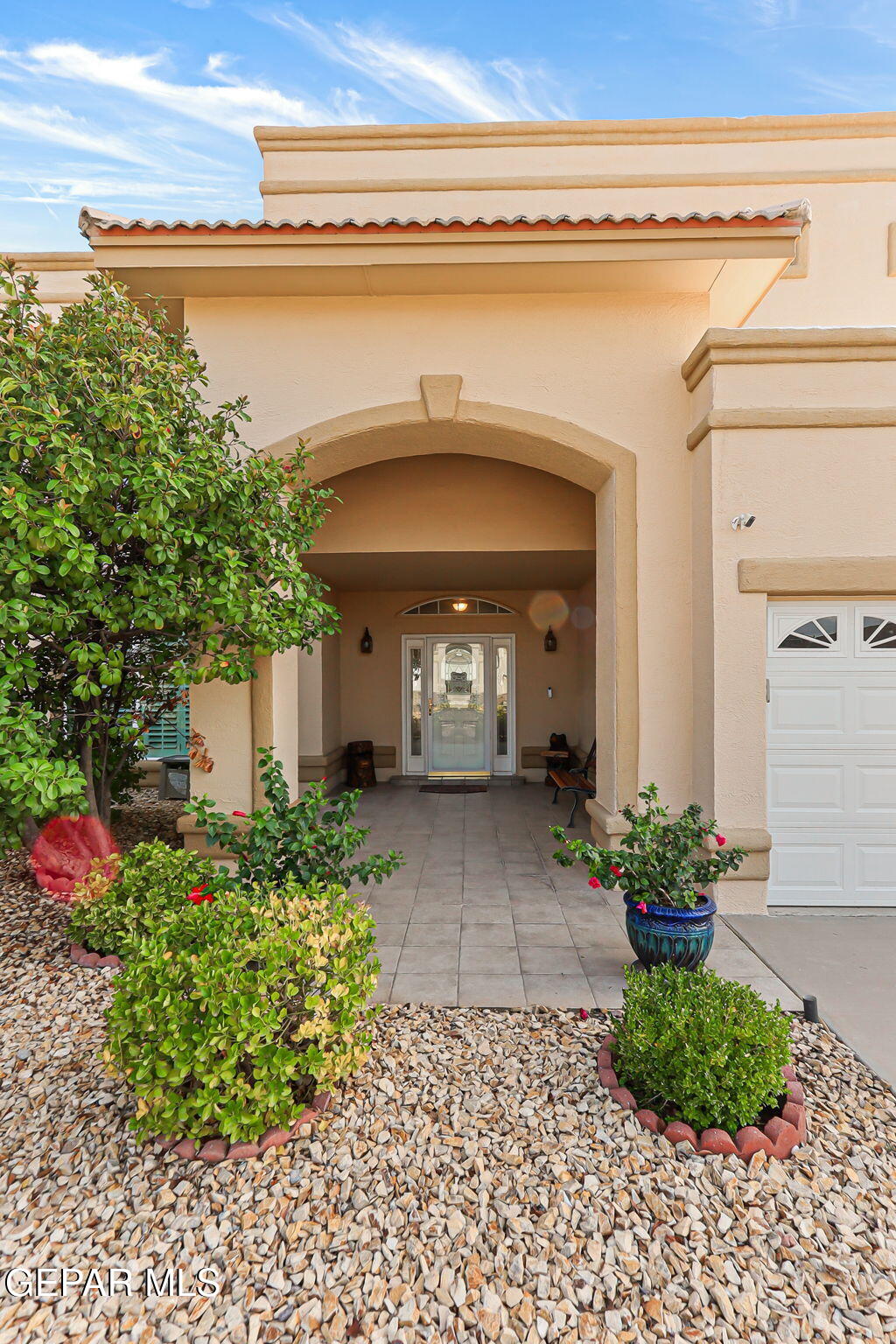 6544 Royal Ridge Drive El Paso, TX 79912 - Photo 3 of 58 a front view of a house with a entryway