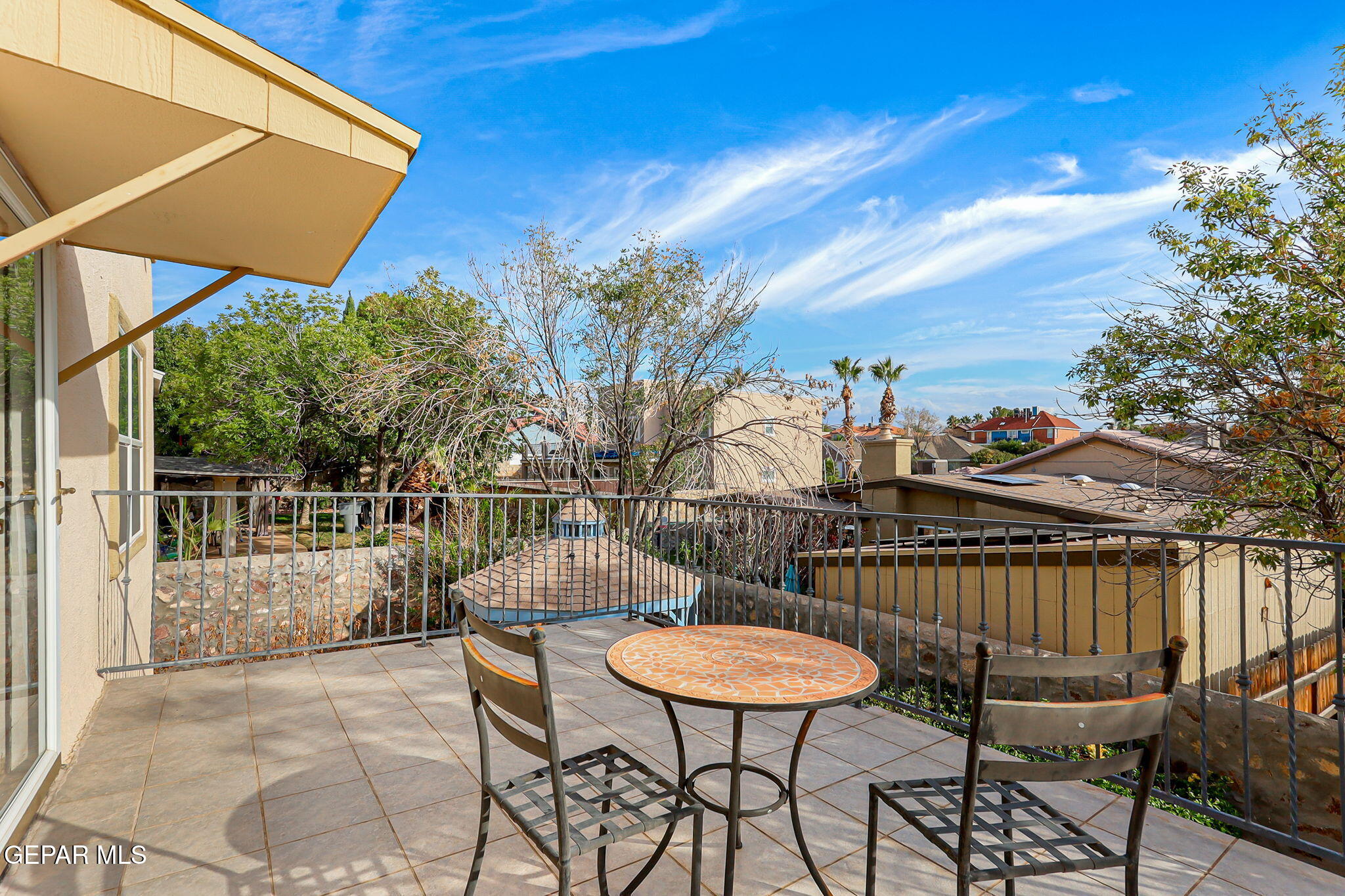 6544 Royal Ridge Drive El Paso, TX 79912 - Photo 46 of 58 a view of a chairs and table in the patio