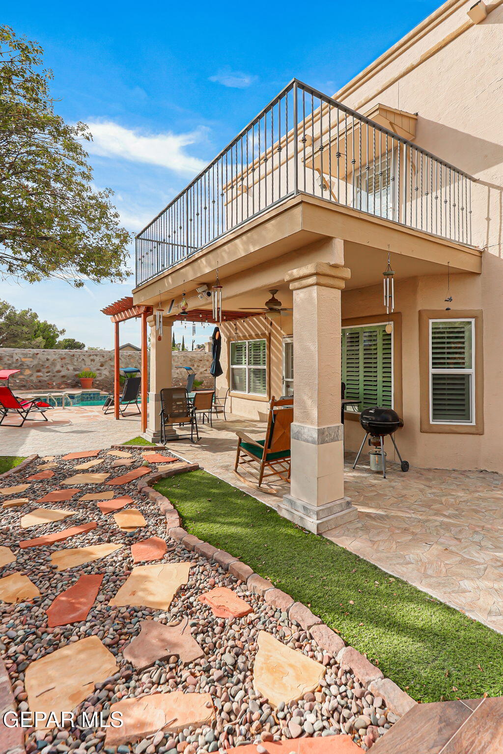 6544 Royal Ridge Drive El Paso, TX 79912 - Photo 48 of 58 a view of a house with backyard porch and sitting area