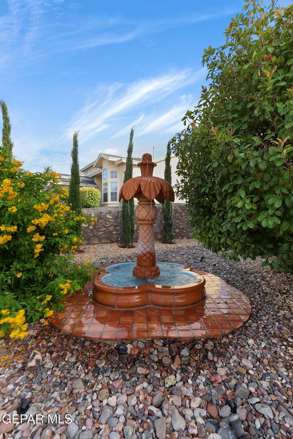 6544 Royal Ridge Drive El Paso, TX 79912 - Photo 56 of 58 a water view with a fountain