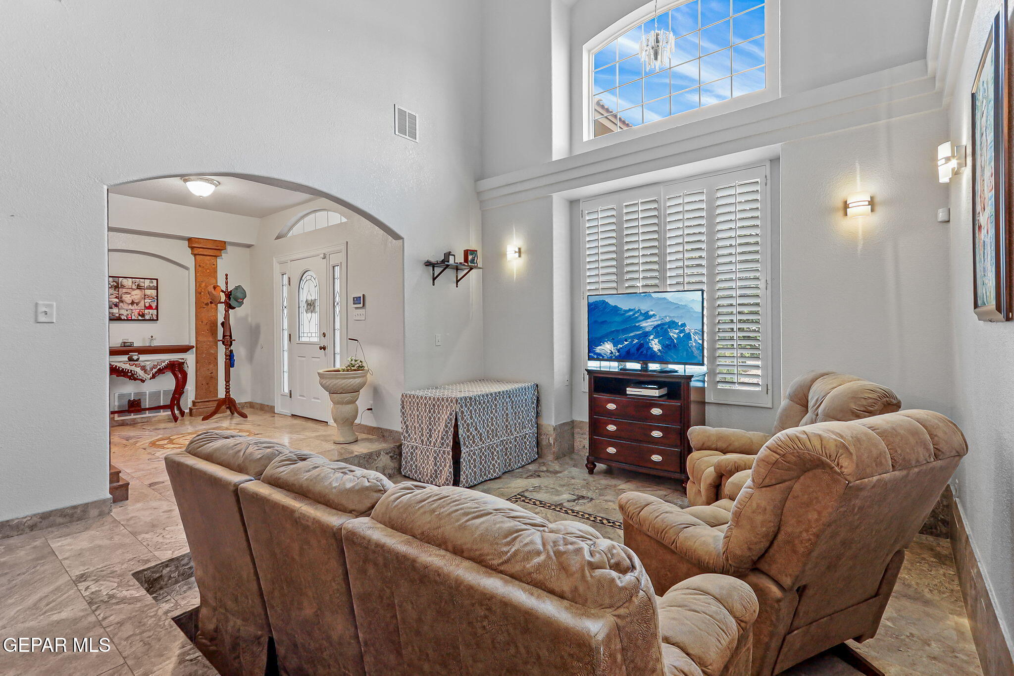 6544 Royal Ridge Drive El Paso, TX 79912 - Photo 10 of 58 a living room with furniture and a window