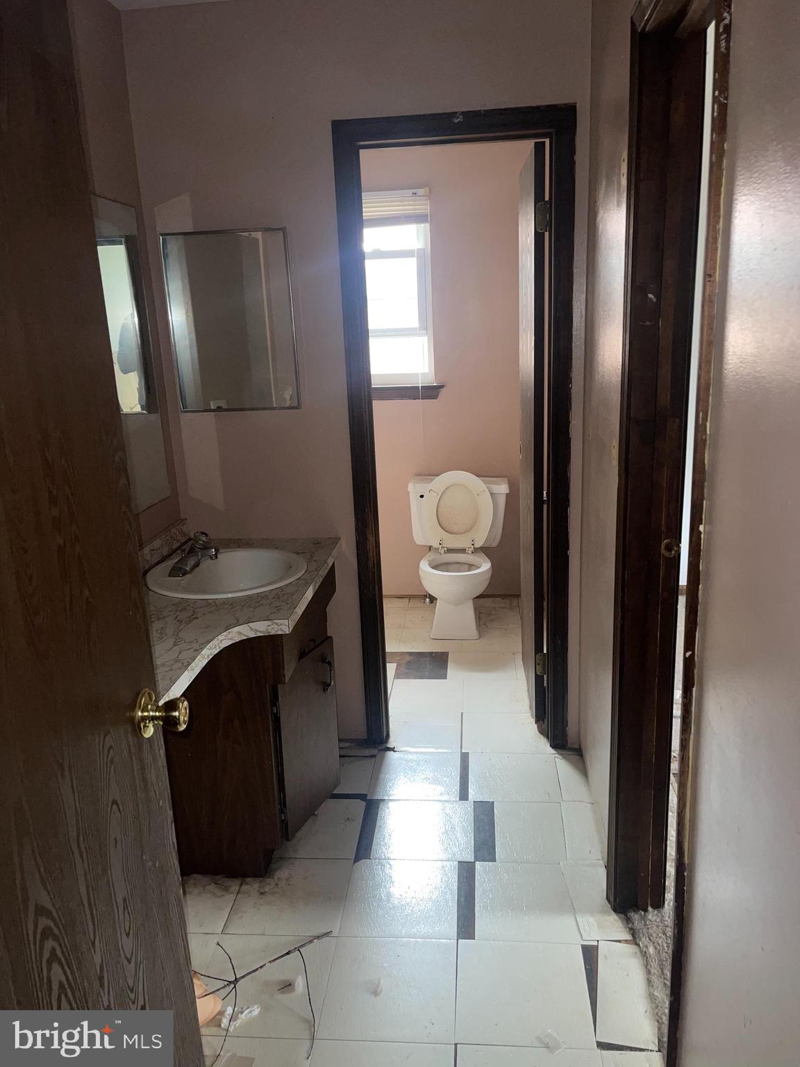 2857 Erial Road Sicklerville, NJ 08081 - Photo 13 of 48 a bathroom with a sink and a mirror