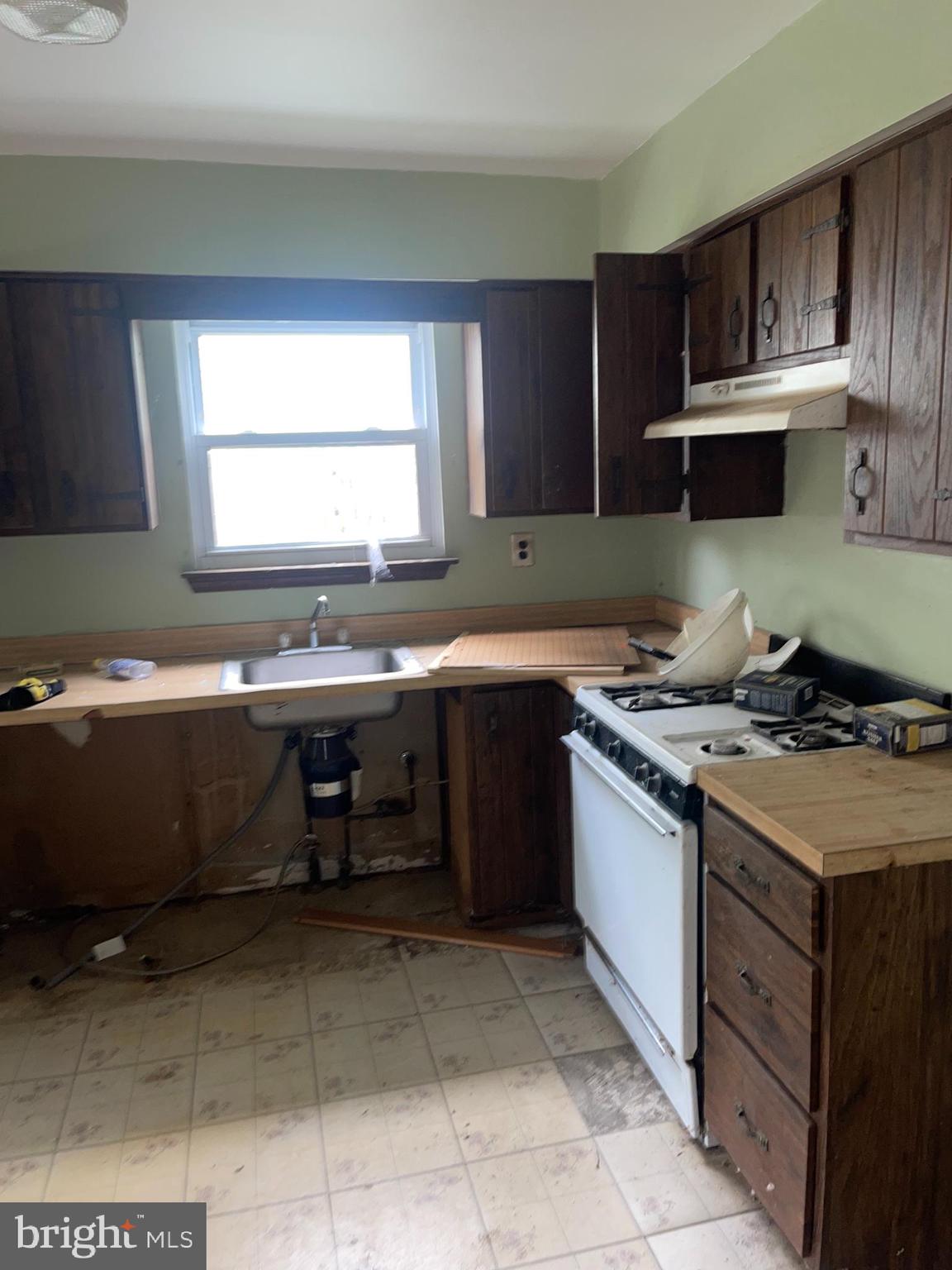 2857 Erial Road Sicklerville, NJ 08081 - Photo 30 of 48 a kitchen with a stove and a sink