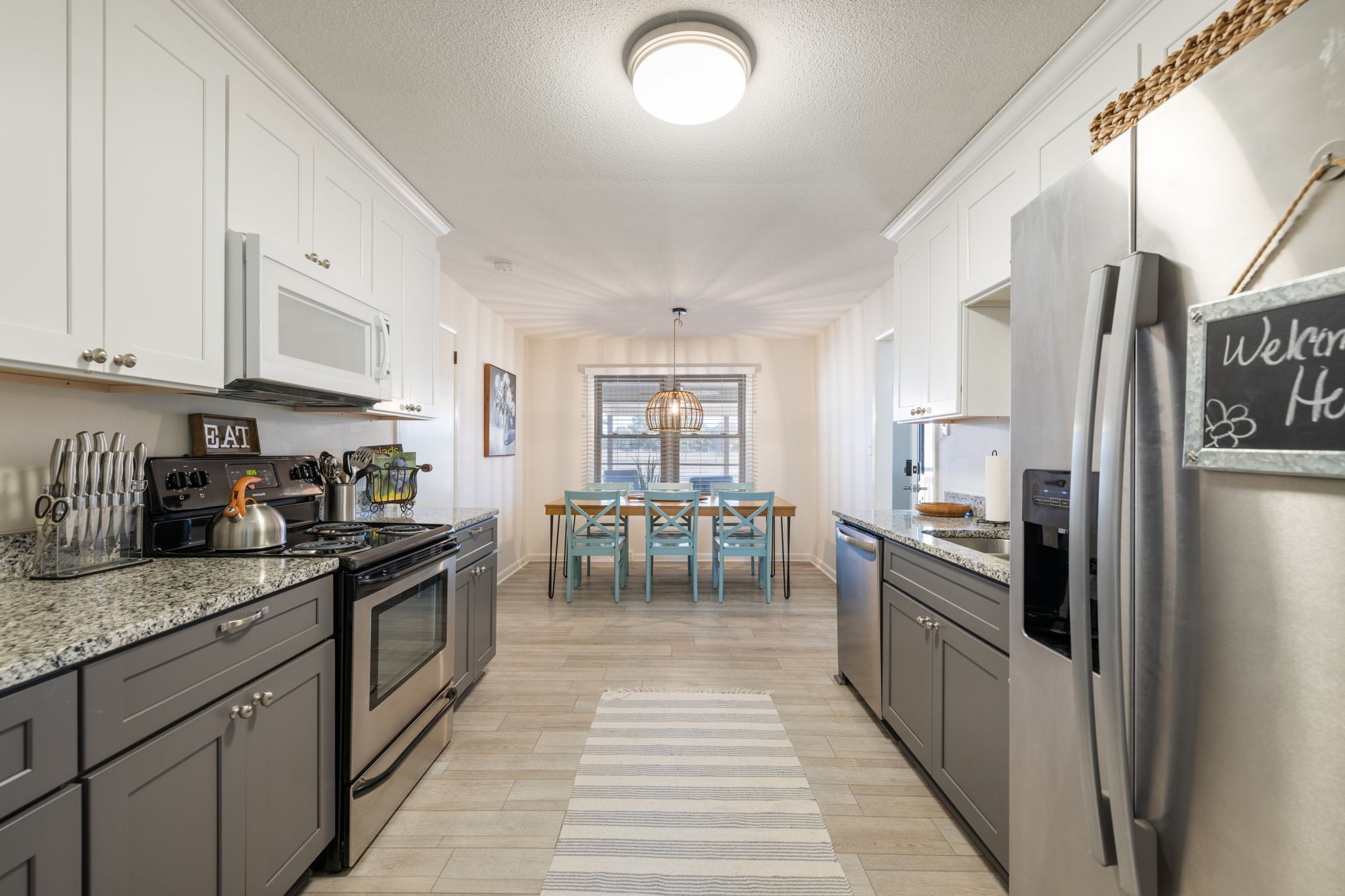 1755 Mc Bride Road Lewisburg, TN 37091 - Photo 16 of 59 a kitchen with granite countertop a refrigerator stove top oven and sink