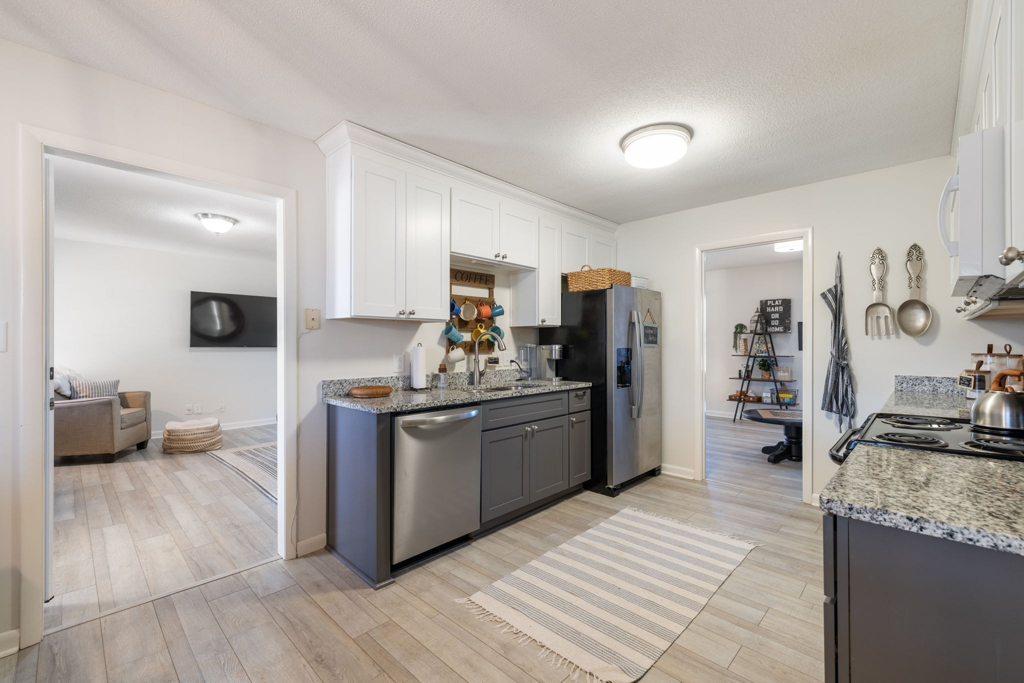 1755 Mc Bride Road Lewisburg, TN 37091 - Photo 17 of 59 a kitchen with stainless steel appliances granite countertop a refrigerator stove top oven and sink