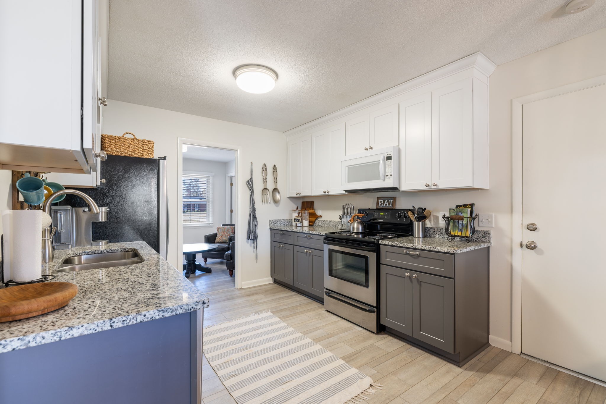 1755 Mc Bride Road Lewisburg, TN 37091 - Photo 20 of 59 a kitchen with stainless steel appliances granite countertop a sink stove and refrigerator