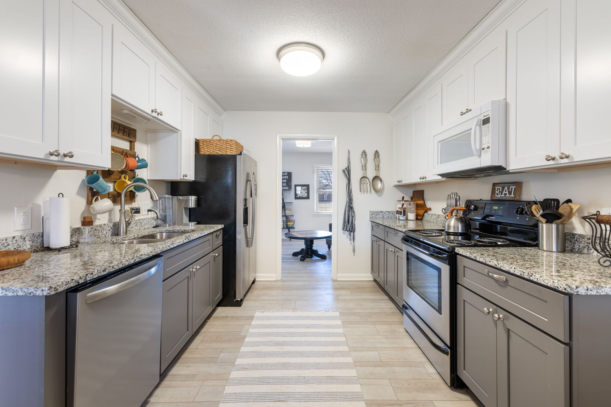 1755 Mc Bride Road Lewisburg, TN 37091 - Photo 21 of 59 a kitchen with granite countertop stainless steel appliances and counter space