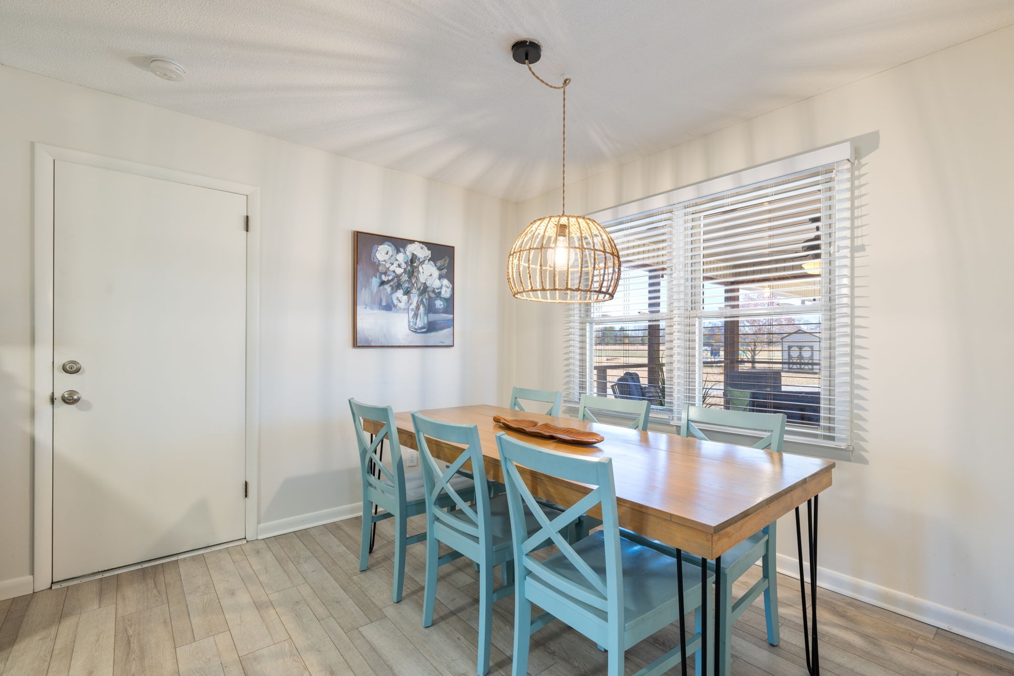 1755 Mc Bride Road Lewisburg, TN 37091 - Photo 25 of 59 a dining room with furniture a chandelier and wooden floor