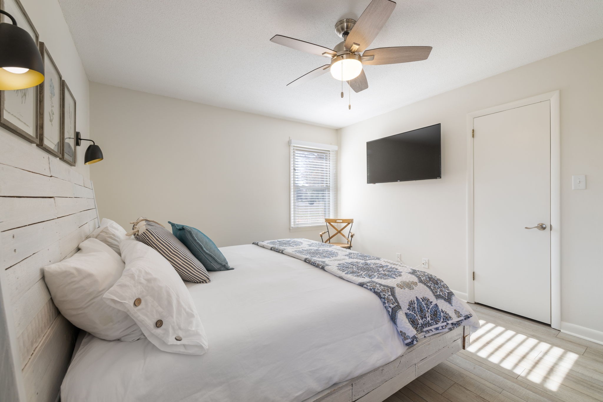 1755 Mc Bride Road Lewisburg, TN 37091 - Photo 27 of 59 a bedroom with a bed and a flat screen tv