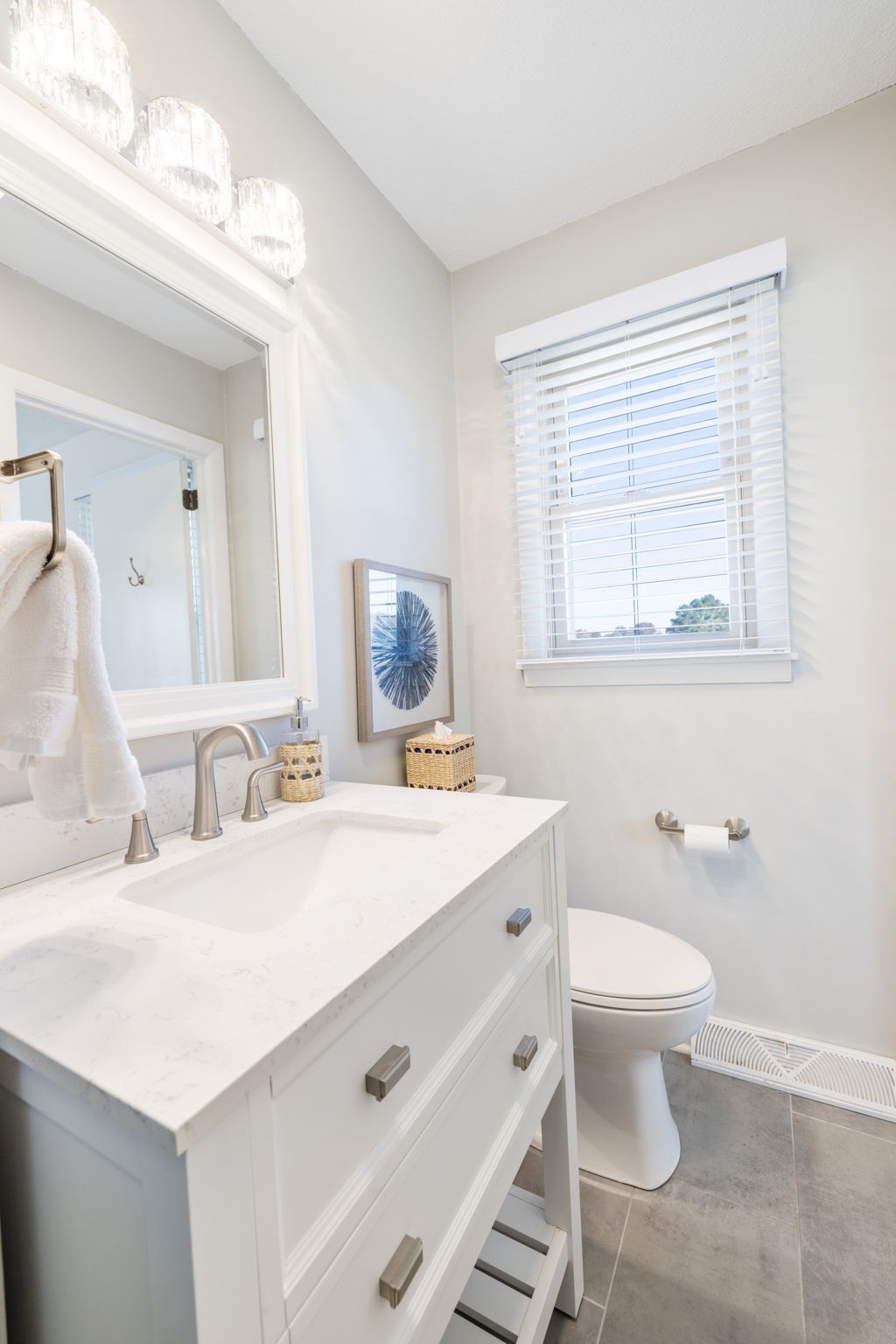 1755 Mc Bride Road Lewisburg, TN 37091 - Photo 31 of 59 a bathroom with a sink toilet vanity and mirror
