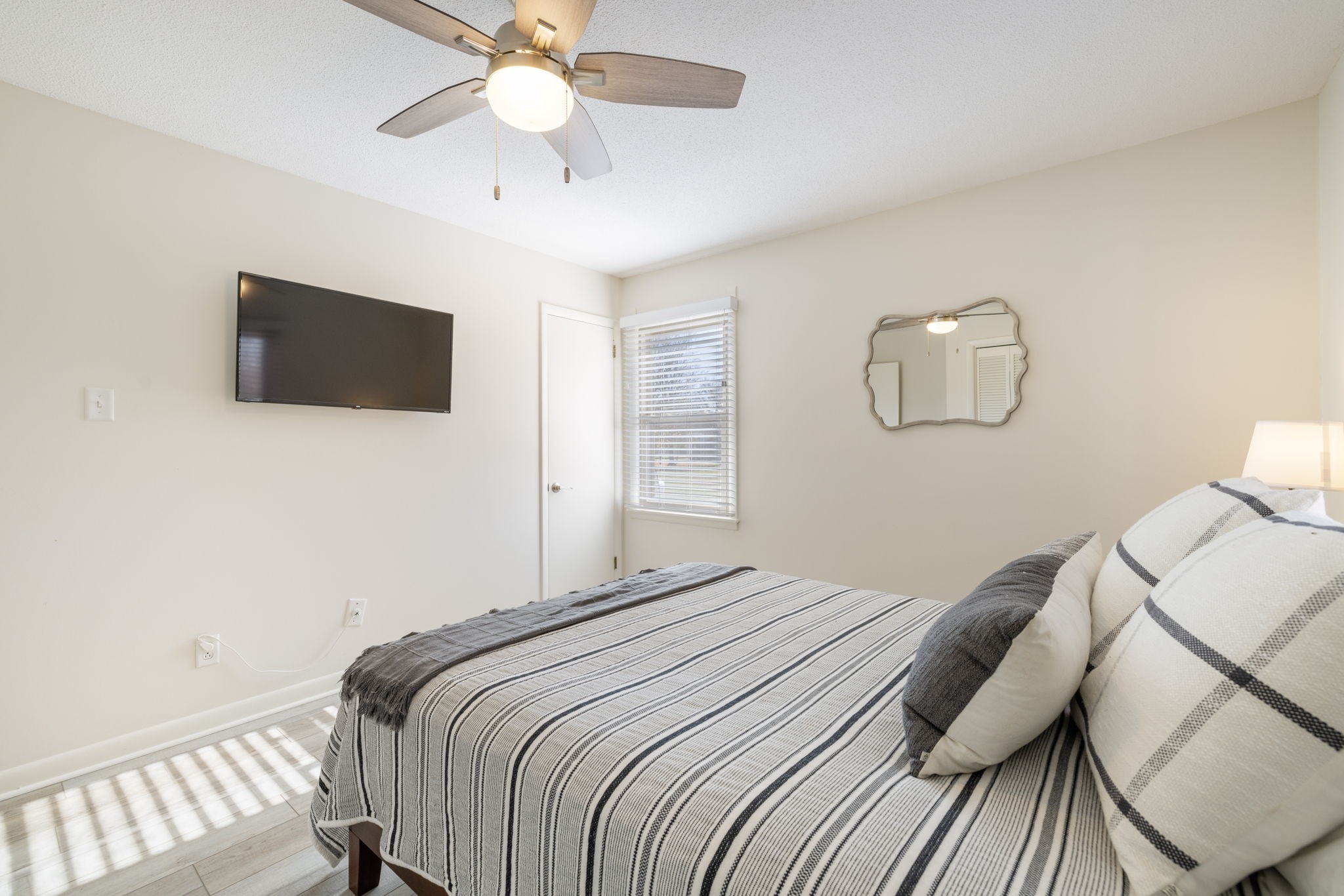 1755 Mc Bride Road Lewisburg, TN 37091 - Photo 34 of 59 a bedroom with a bed and a flat screen tv