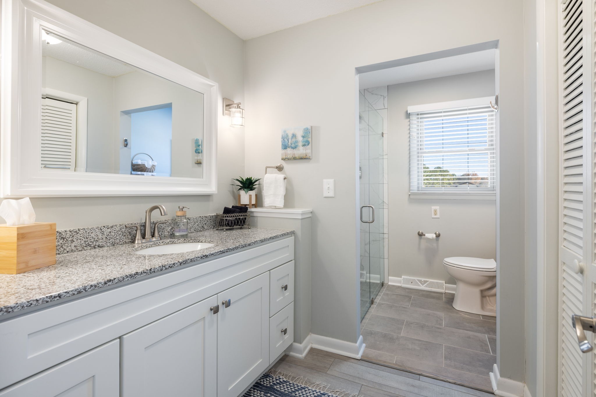 1755 Mc Bride Road Lewisburg, TN 37091 - Photo 37 of 59 a bathroom with a granite countertop sink and a mirror