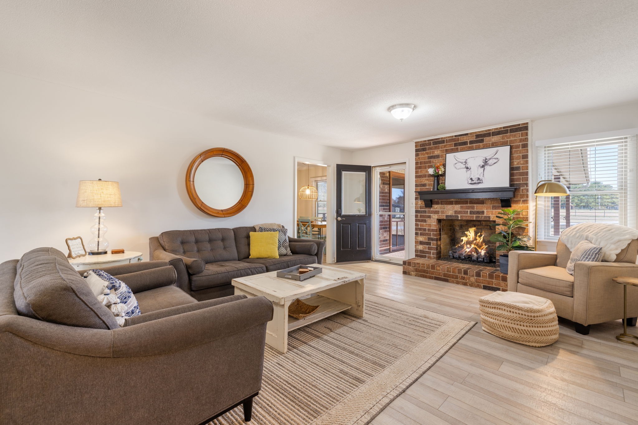 1755 Mc Bride Road Lewisburg, TN 37091 - Photo 4 of 59 a living room with furniture a fireplace and a large window