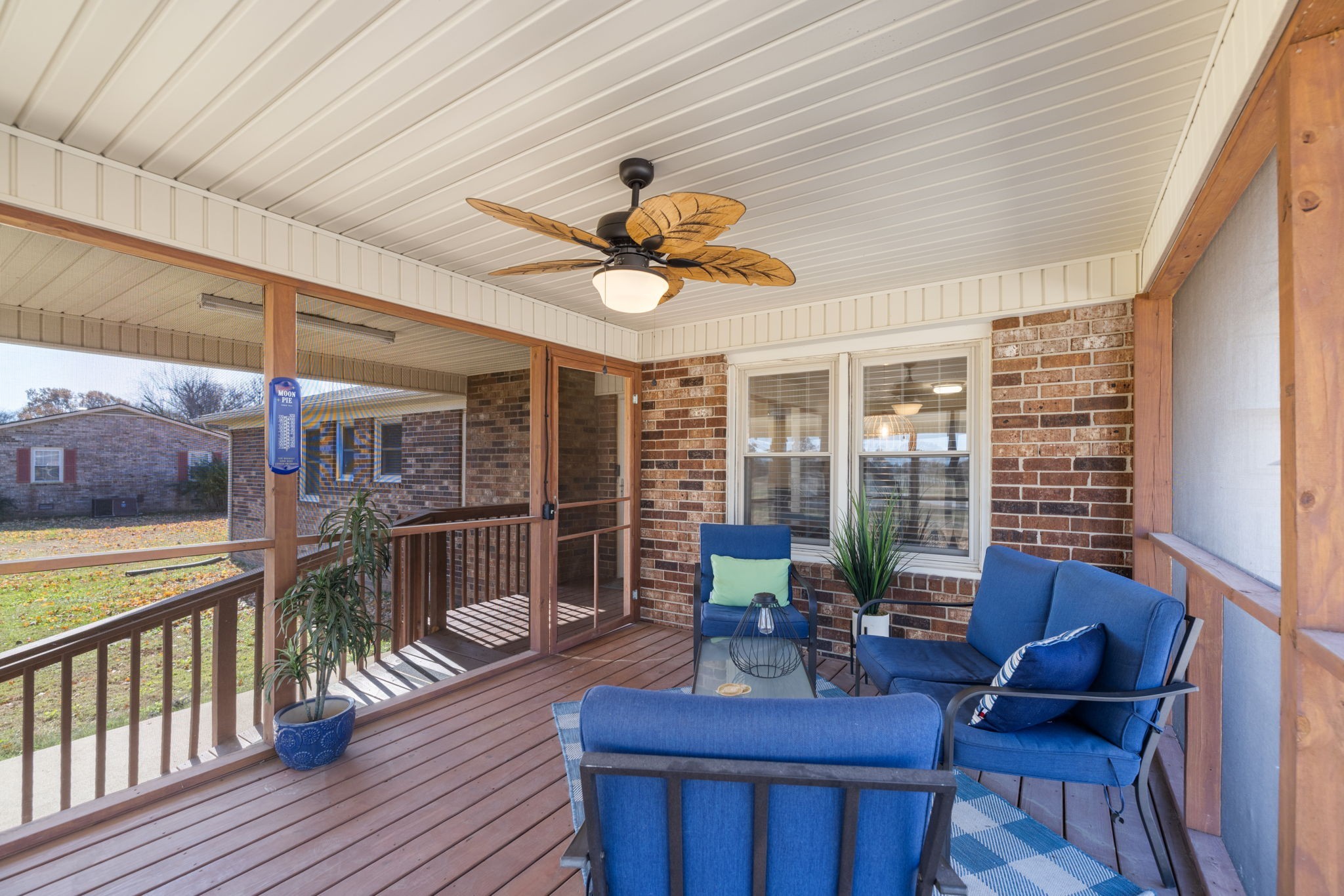 1755 Mc Bride Road Lewisburg, TN 37091 - Photo 45 of 59 a living room with furniture a chandelier and a large window