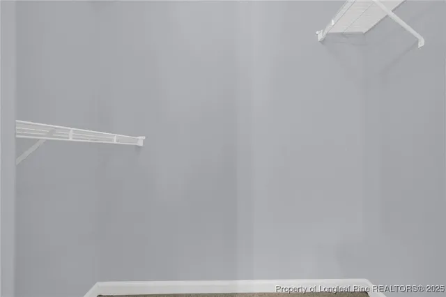 a view of small space with racks on the wall