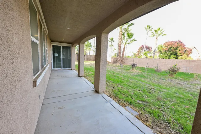 a view of porch with a garden