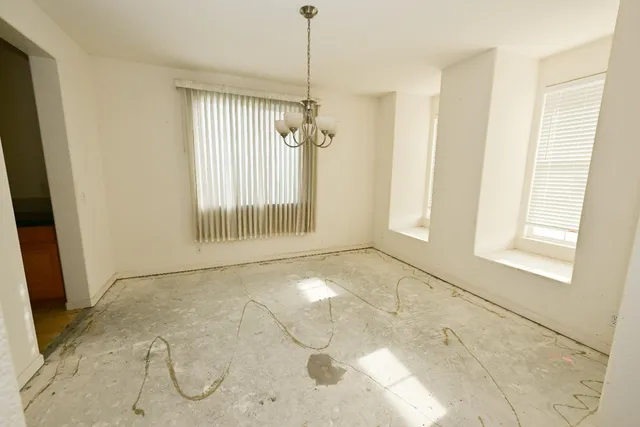 a view of a room with a windows